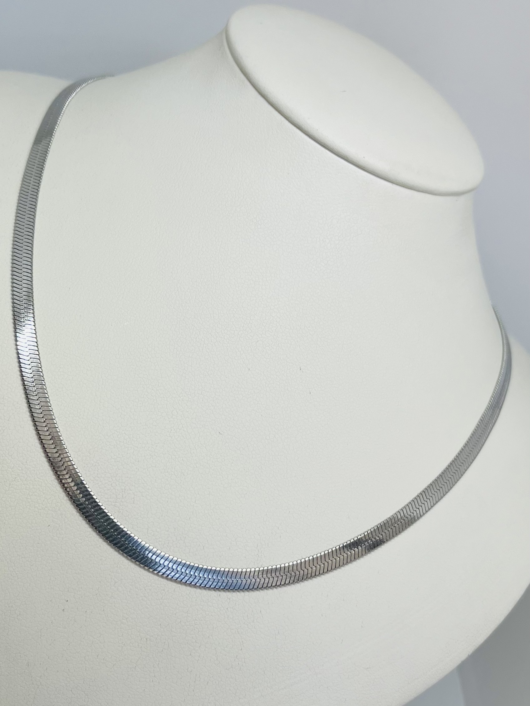 Cadena planchada plateada