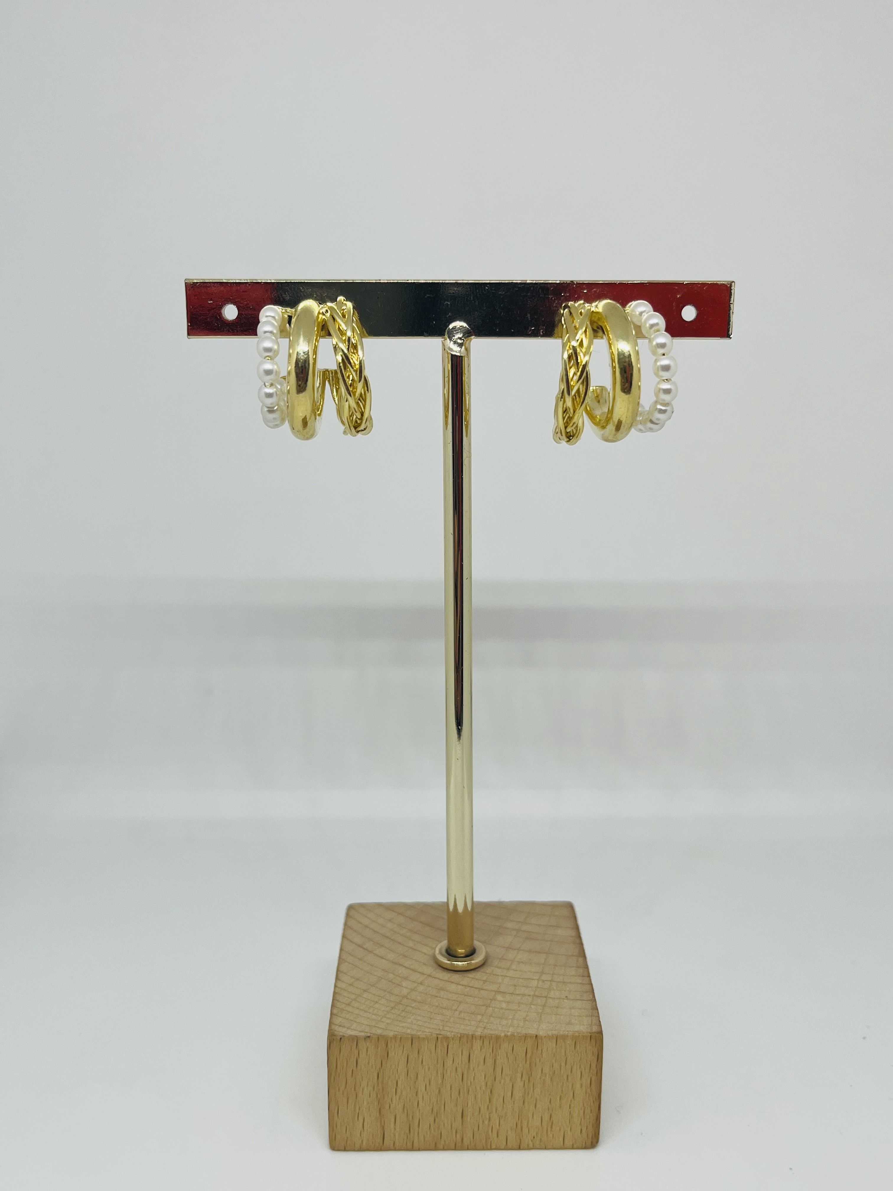 arracada triple con perlas